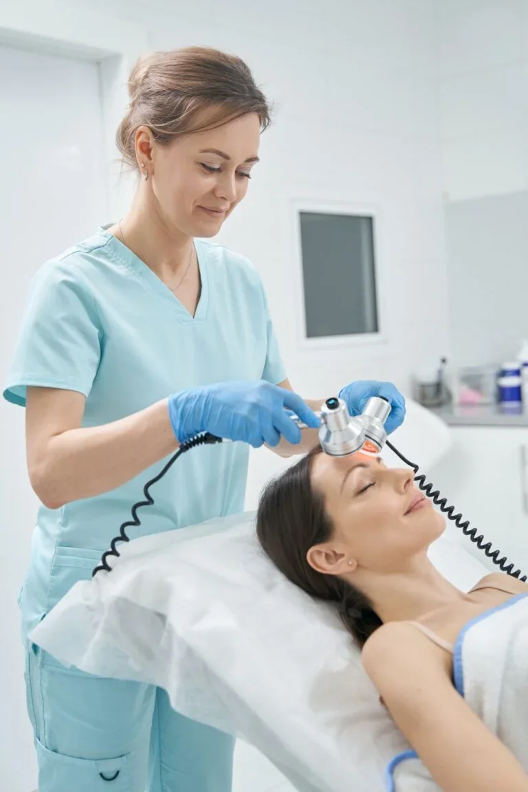 cosmetologist-performing-radiofrequency-facial-treatment-in-clinic-768x1152